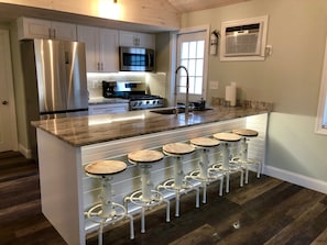 Gourmet Stainless/Granite Kitchen with Seating for Six.