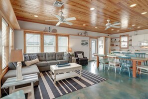 Indoor - Open flow from living area into dining/kitchen areas