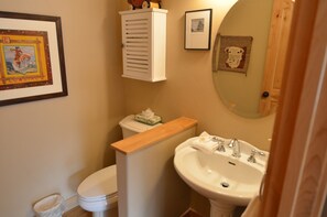 Bathroom on Main Floor - Bathroom on main level, next to the kitchen.