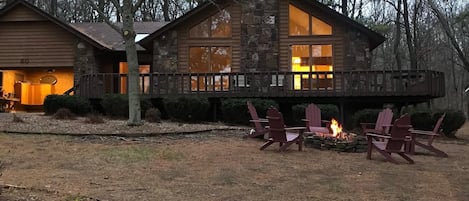 Front of the house in the evening. We recently moved the fire pit to backyard.