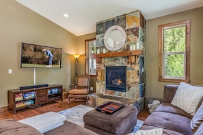 Relax In Front Of The Gas Fireplace On The Cozy Sectional