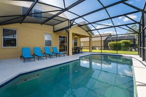 Back of home showing sun loungers