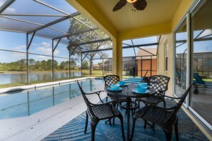 Outdoor dining under covered lanai