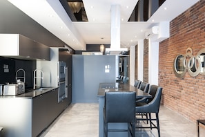 Fully equipped kitchen - utensils, pots and pans available inside cabinets