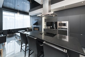 Open concept kitchen with living space