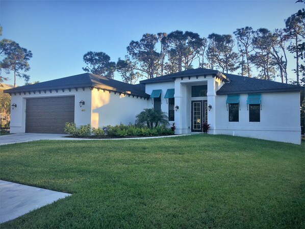 Front of house.  Enjoy the oversized two car garage.