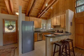 Entry door that leads to the dining and kitchen