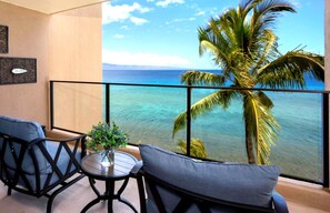 This oceanfront lanai offers front-row views of swaying palms, turquoise waters, and the sound of pure serenity  MAH-611