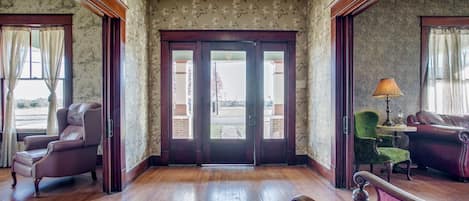 Waltz into the foyer and choose which pocket doors you want to mosey into first.