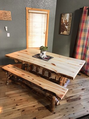 Beautiful handmade aspen table! Benches move easily. Dining with a view.....
