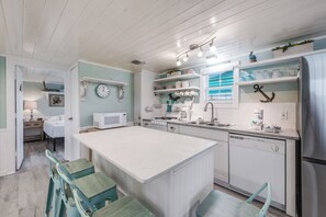 Kitchen - Experience culinary charm in this cozy kitchen, where efficiency meets elegance