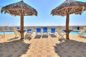 Relax at Grand Caribbean's community pool