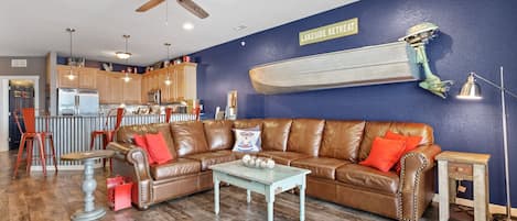 Check out that boat.  The family room has cozy seating for all of your guests.