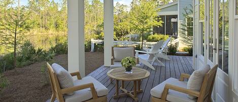 Calming view of the Pine Lily Circle pond from the spacious back patio.