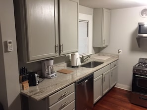 Fully equipped kitchen with granite counter tops