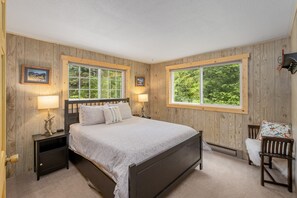 Main floor bedroom 1 with queen bed