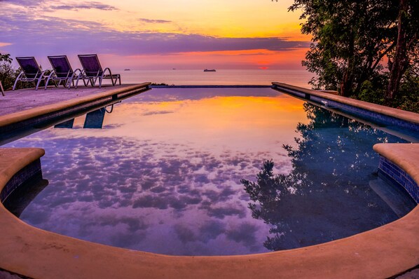 Sunset from infinity edge saltwater pool