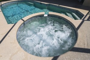 View of pool and spa