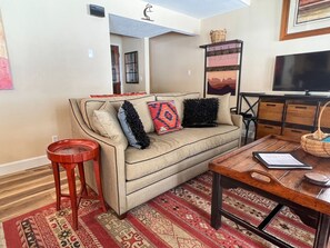A view of the sofa and our Smart TV so you can stream your favorite shows