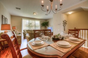 The dining area is fully equipped and beautifully styled, making meals, cocktails, or coffee at the fabulous dining room table or breakfast nook a breeze.