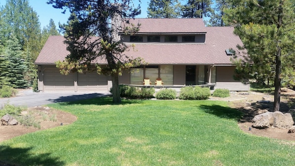 Unique large grassy front yard.  Bring your badminton set!