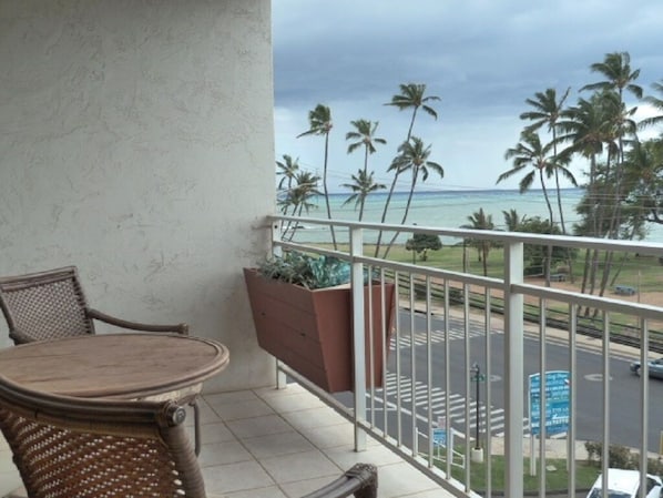 Balcony - Balcony, view south; ocean view and beach park across the street