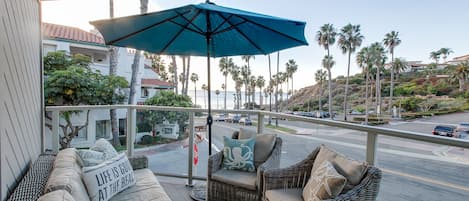 Drink your morning coffee on the deck while watching local surfers.