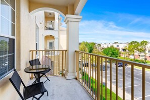 Secluded Skyline Sanctuary: Escape to your private balcony, offering breathtaking views of the city skyline for a truly serene retreat
