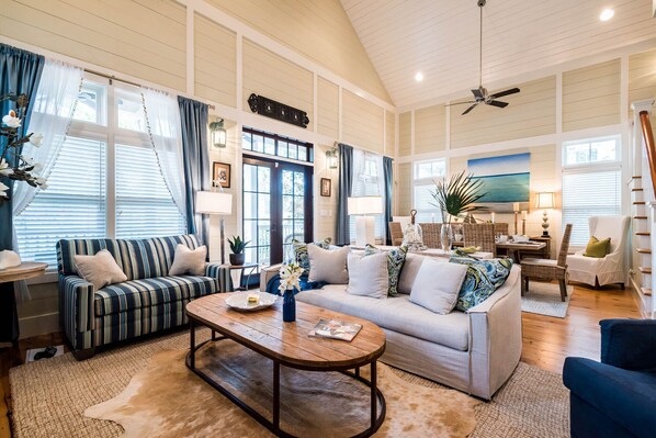 Two story vaulted living room, dining room combination