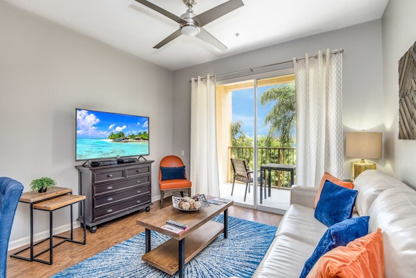 Living room with 55" TV and stunning views of lake Cay