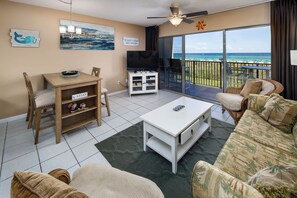 Living Room - Open floor plan with great color and gorgeous decorations throughout.  Comfortable living area with flat screen TV, sofa sleeper with a queen-size memory foam mattress, and an UNFORGETTABLE VIEW!
