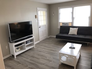 Living room with 55” smart tv