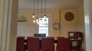 nautical themed dining area is open to the kitchen and living areas 