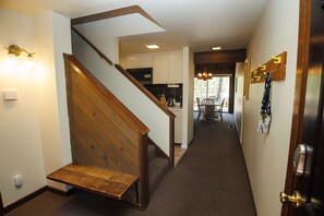 Entry.  To the right is are two Bedrooms and to the left is the downstairs Full Bath
