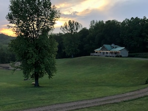 The lodge is located on the top of a hill overlooking the valley.
