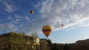 Balloons flying over our home