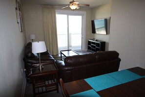 Living Room, Sleeper Sofa with Love Seat and a 55' Flat Screen TV