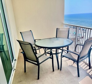 Seating for four at the balcony dining table.