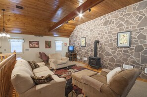 Studio showing the living room, gas fireplace