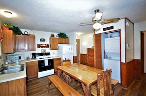 Kitchen & Dining Area with washer & dryer