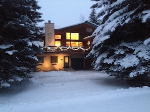Evening view of the home in winter.
