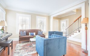 Enjoy catching up in the bright and cozy parlor room.