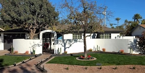 Archway to front door and  private patio entertaining 