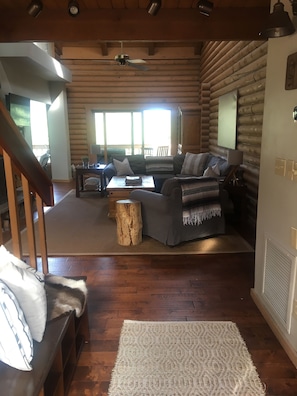 Beautiful wood floors and log walls. This is a real log cabin! 
