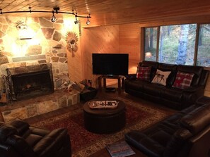  Cozy Living Room with 1 of 2 wood burning fireplaces