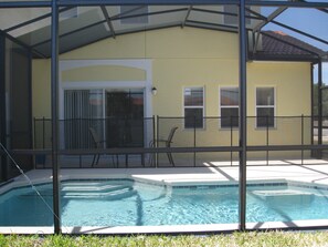 Private pool with security fence & patio area