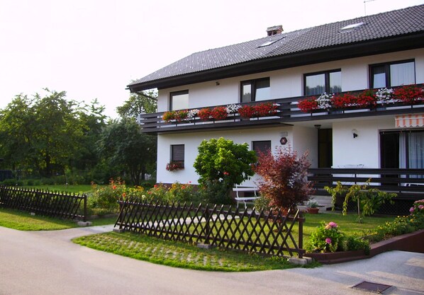 Exterior of the house in the summer.