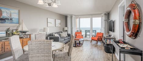 Enjoy the stunning view of the Gulf from the living room and dining area