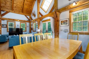 Ground floor dining area with lounge behind