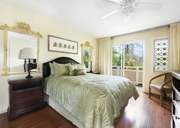 Inviting, spacious bright 'Aloha' style bedroom with queen bed, luxury, high thread count linens & glass sliders to lanai & pool/spa
